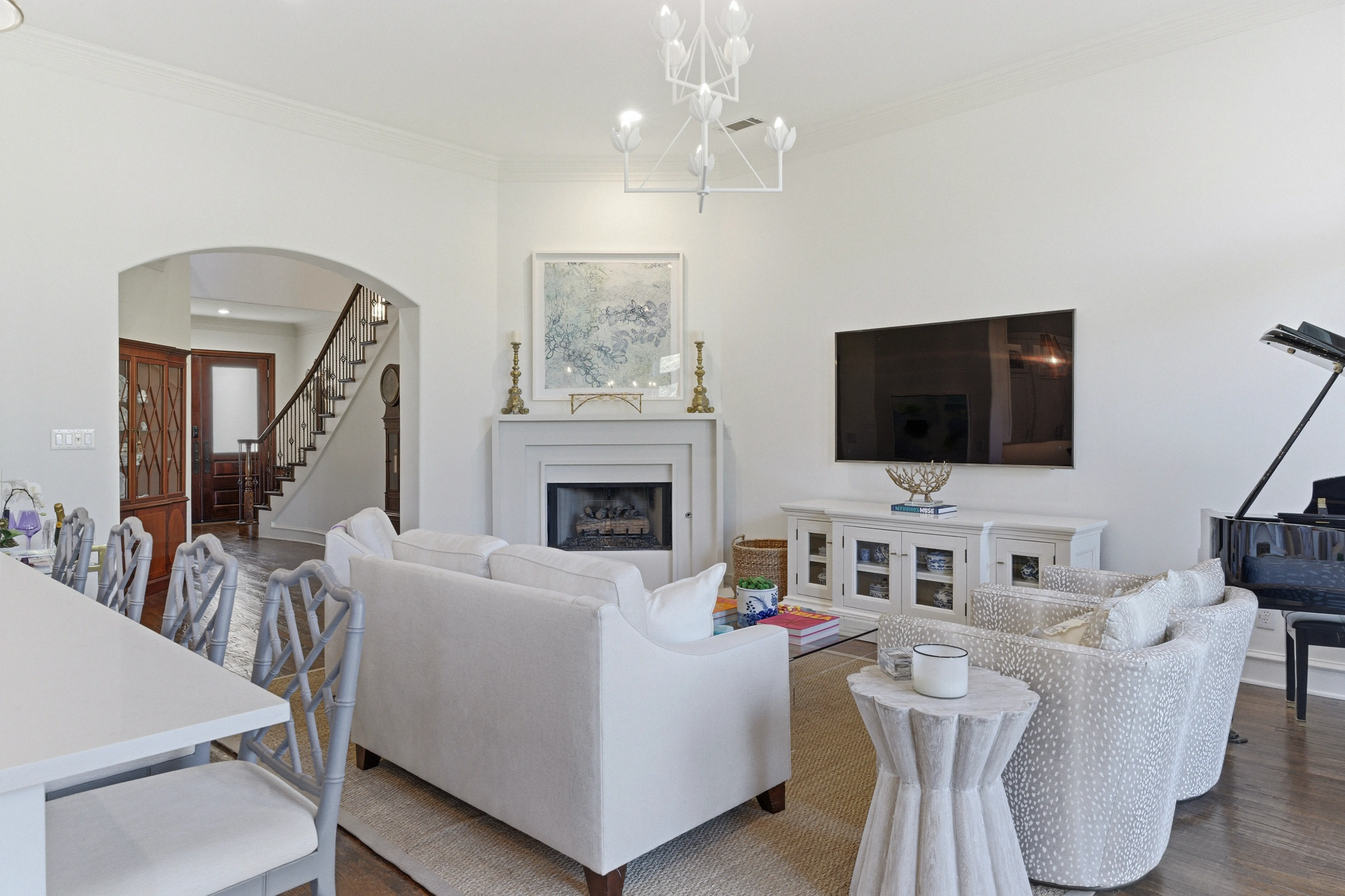 Living room with fireplace and vaulted ceilings